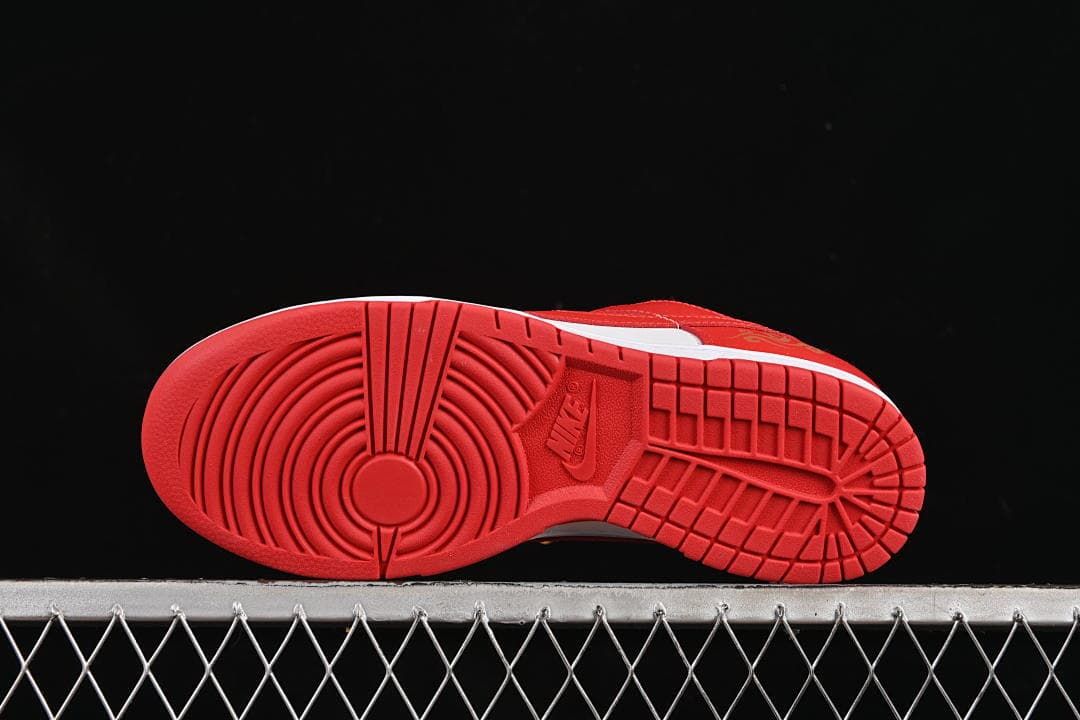 Underside view showing the red outsole tread