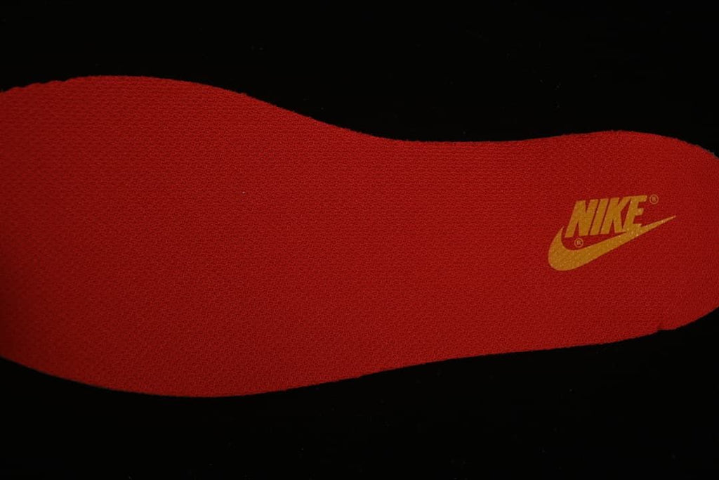 Red insole with a Nike logo