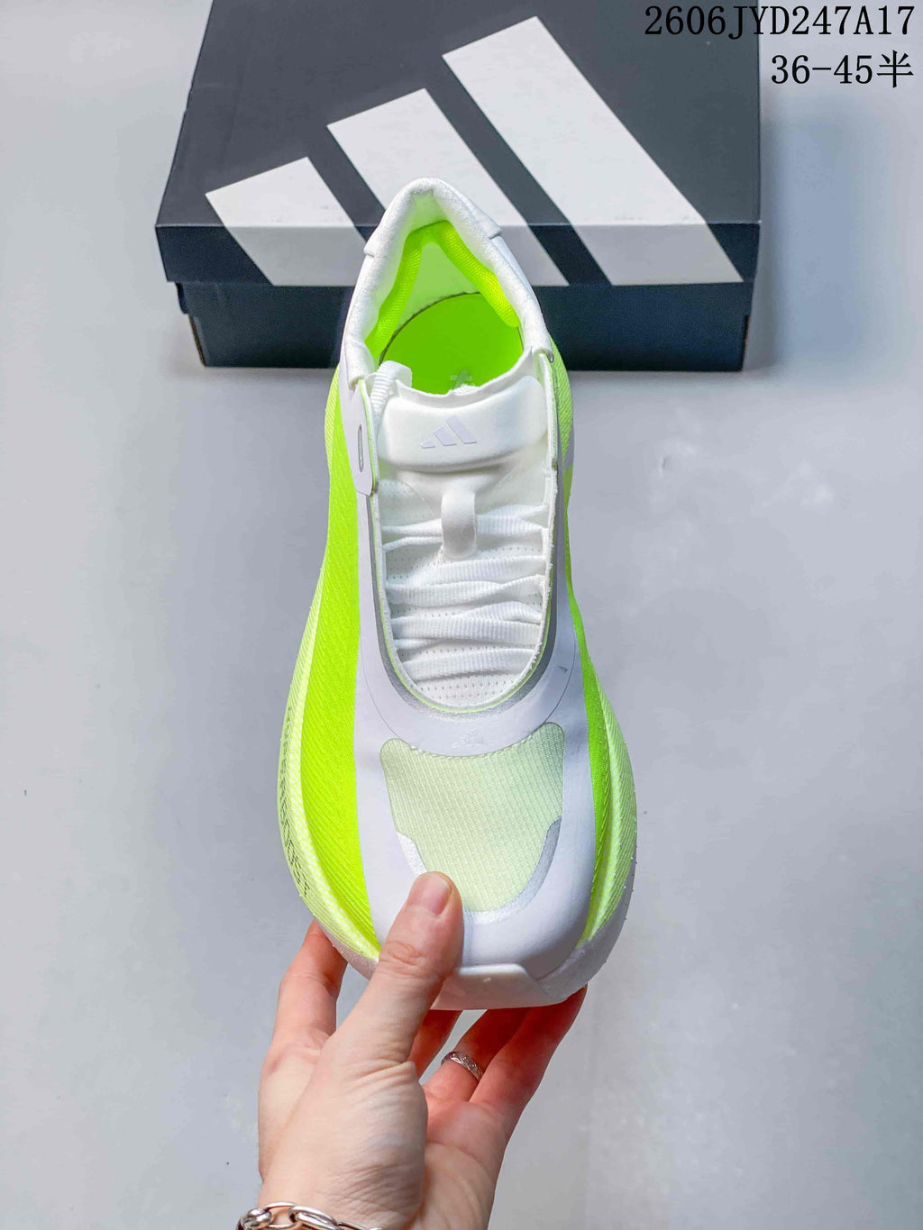 Top view of the sneaker showing its lace-up front and neon-lime accents