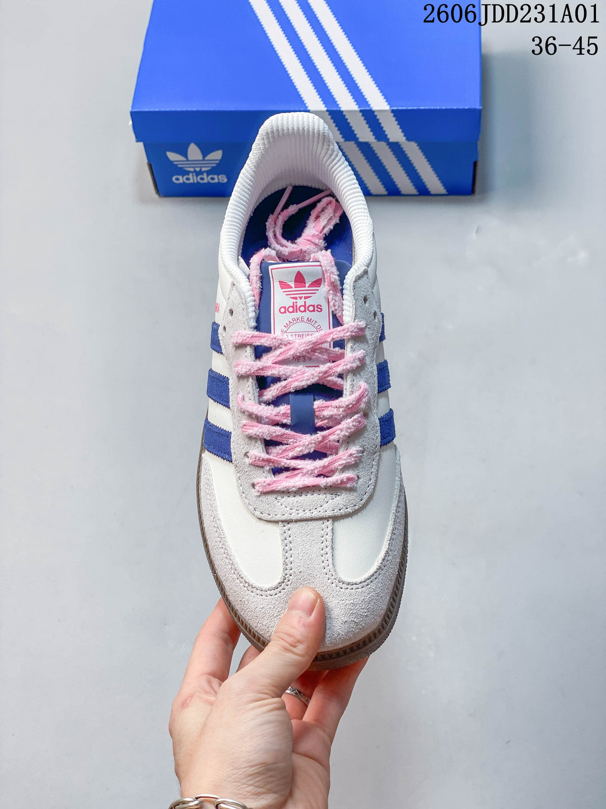 Top view of the sneaker showing pink laces and blue stripes