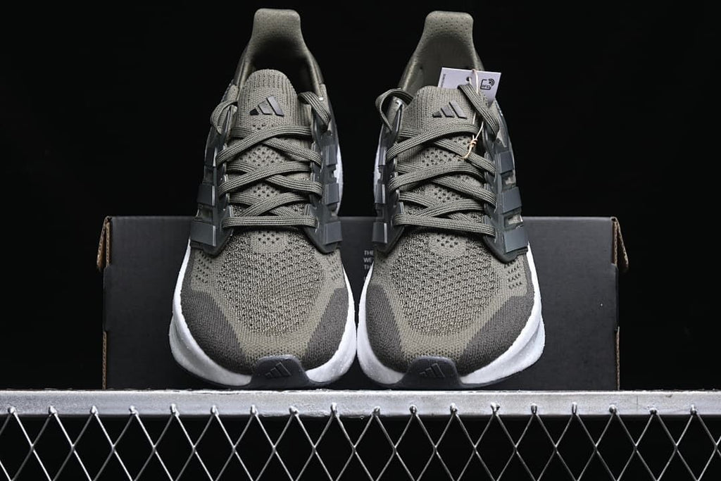 Front view of the pair showing the olive uppers and lace-up design