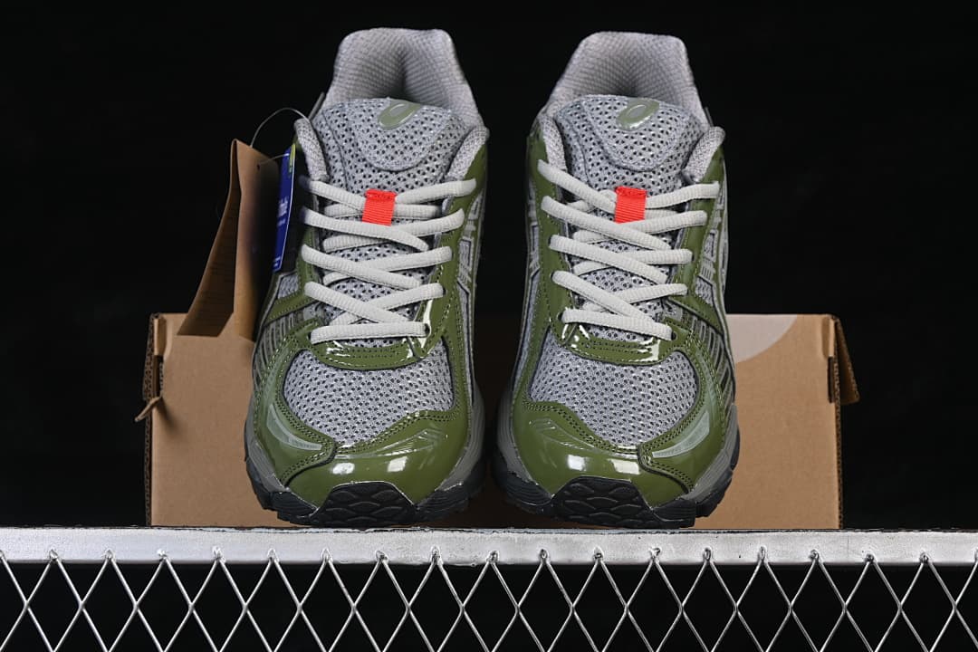 Front view of the pair showing gray uppers and olive-green overlays.