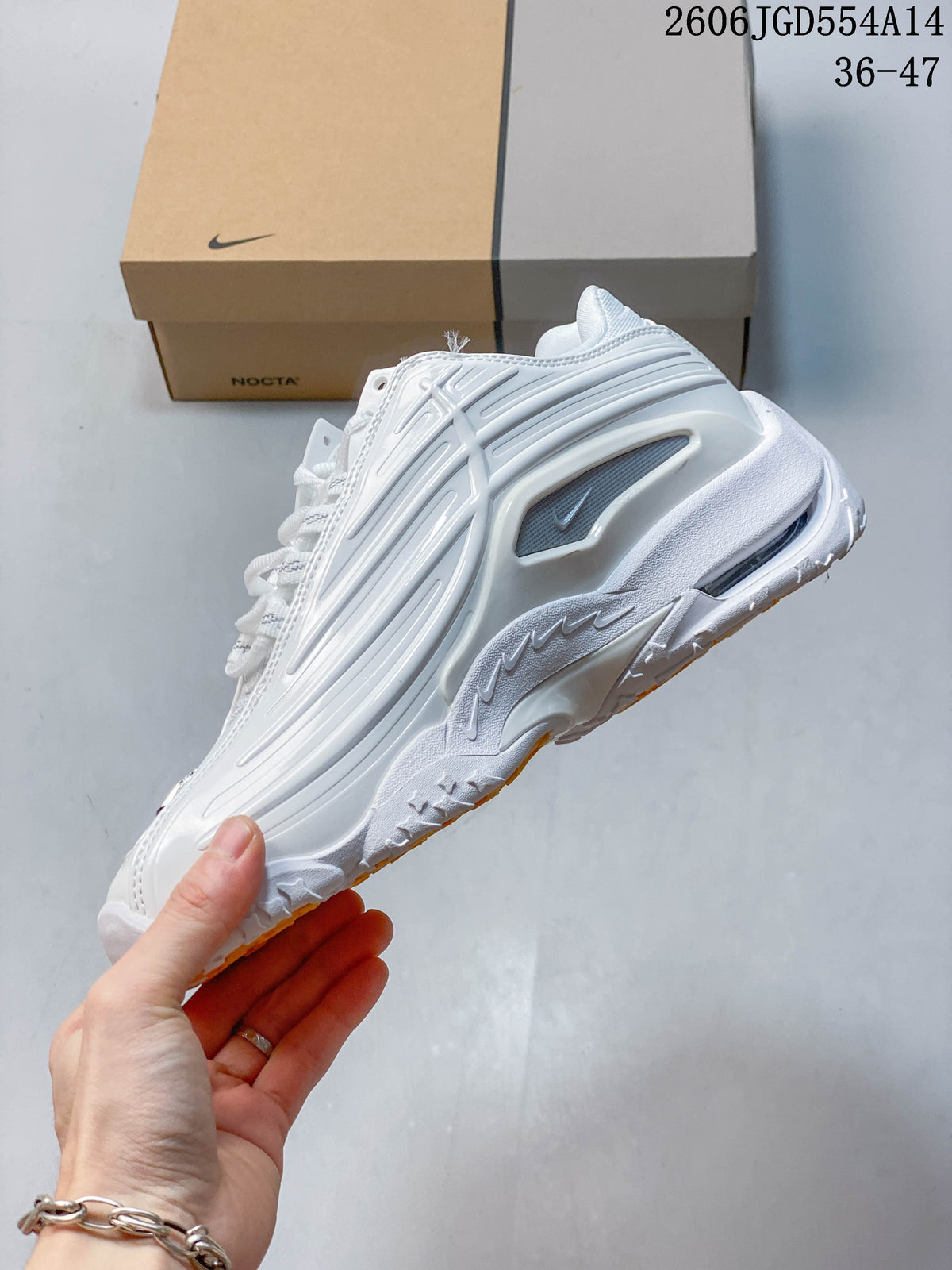 Side view showing the sculpted panels and chunky sole