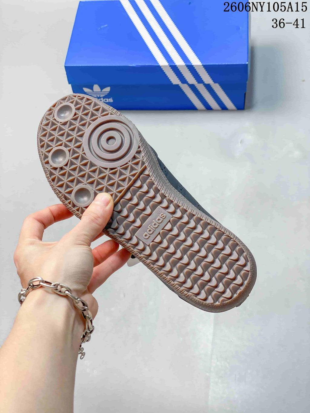 Close-up of the patterned gum-colored outsole on an adidas Originals Samba Jane shoe.
