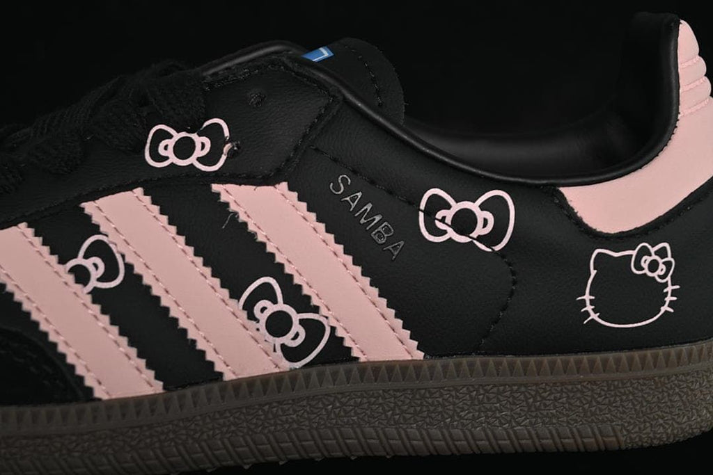 Close-up of pink stripes and character graphics on the shoe