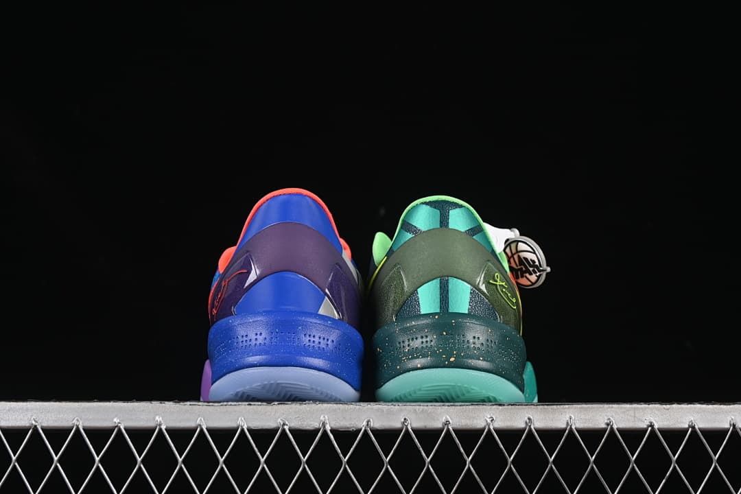 Rear view of blue and green shoes showing contrasting heel designs