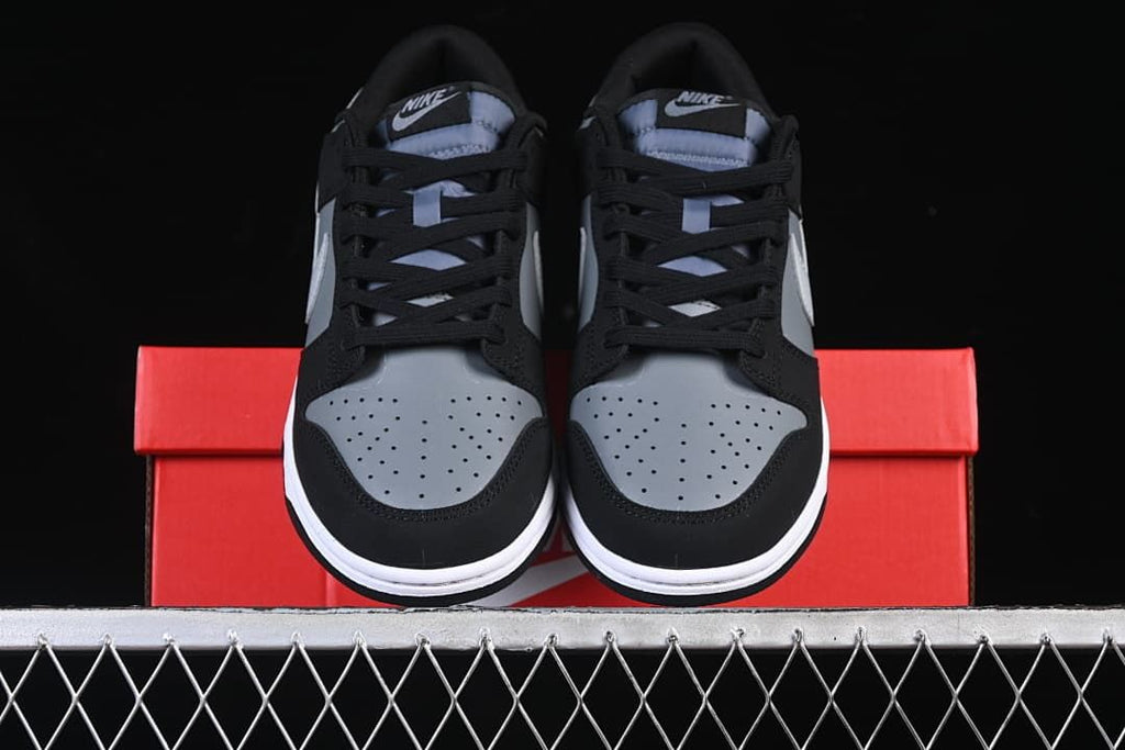 Front view of the pair showing perforated toe boxes and lace-up fronts