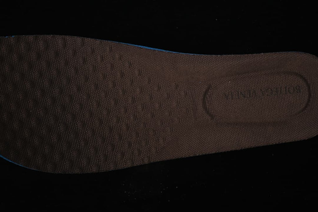 Close-up of the textured brown shoe insole.
