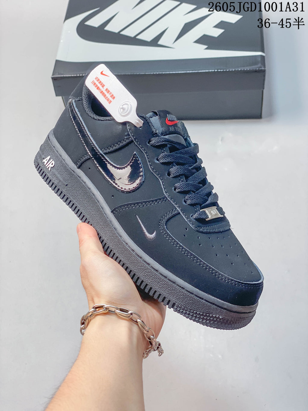 Angled side view of a dark navy Nike Air Force 1 '07 low-top sneaker