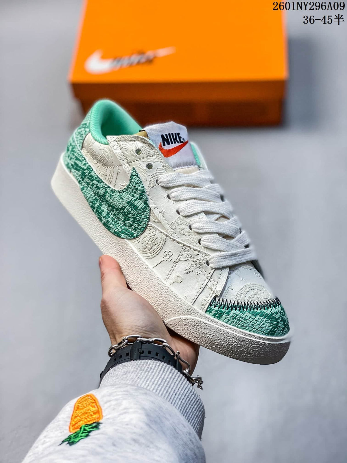 Green and white patterned Nike Blazer Low '77 Jumbo sneaker with an oversized green Swoosh.