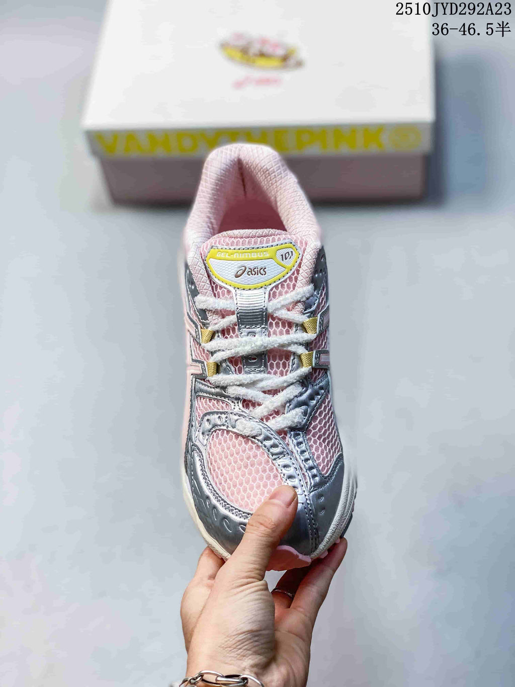 Front view showing the laces, mesh panels and tongue branding
