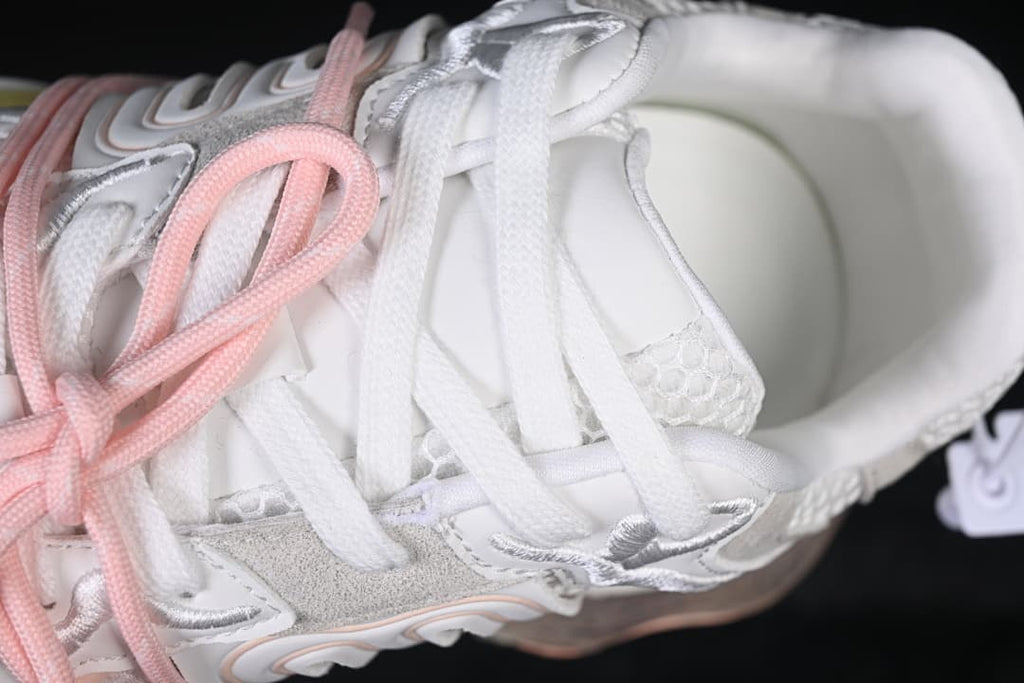 Top-down close-up of the white lacing and padded collar.