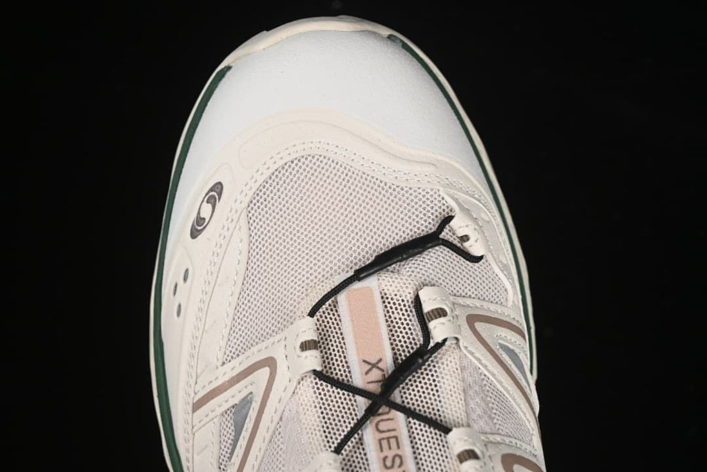 Top-front view showing the mesh-look upper, laces, and toe area.