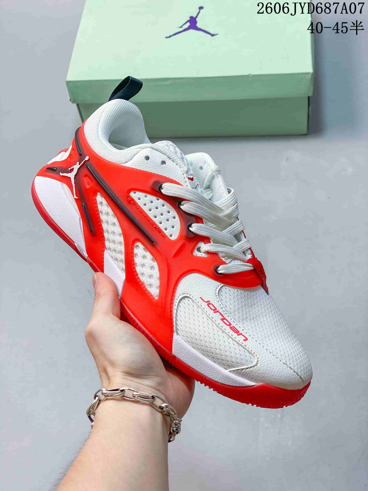 Angled side view of a white and red Jordan Heir PF basketball shoe