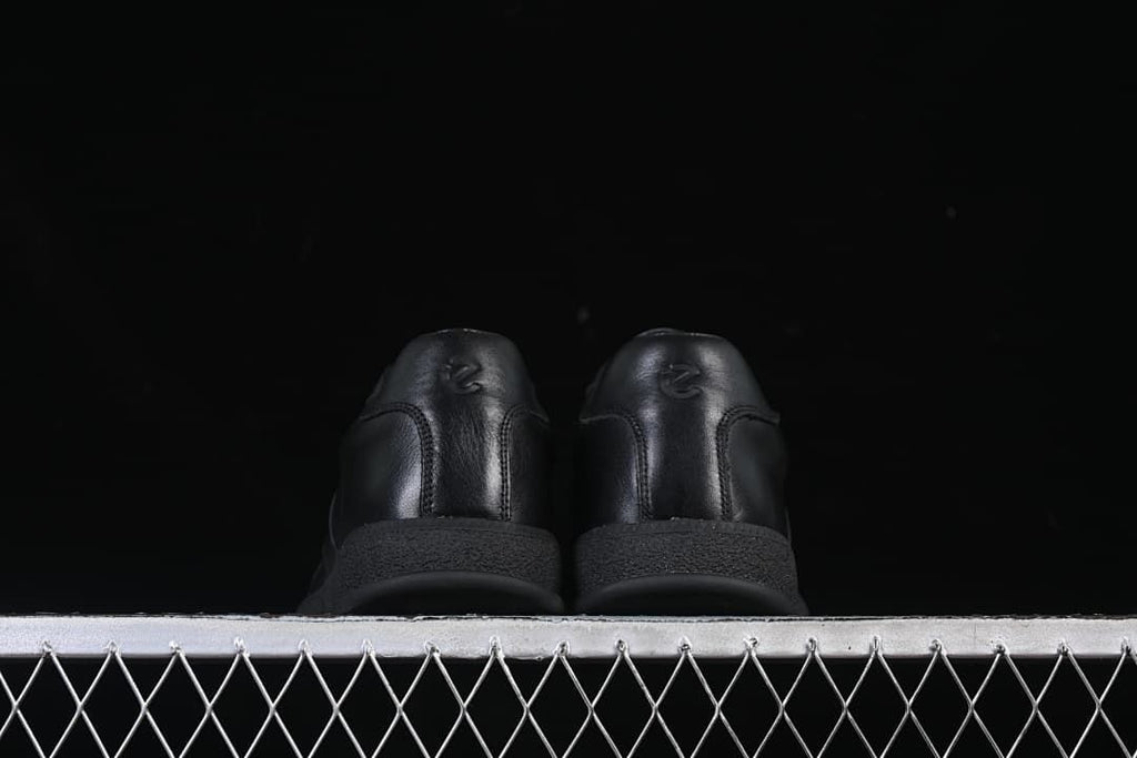 Rear view of both sneakers showing heel details