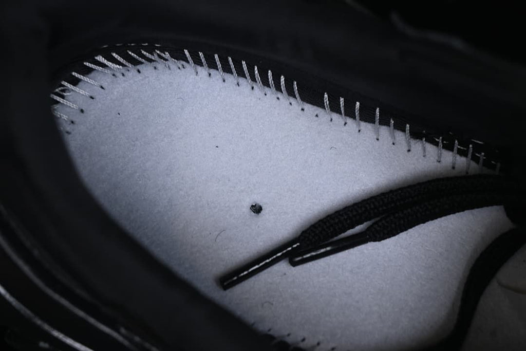 Close-up of the shoe interior and insole stitching