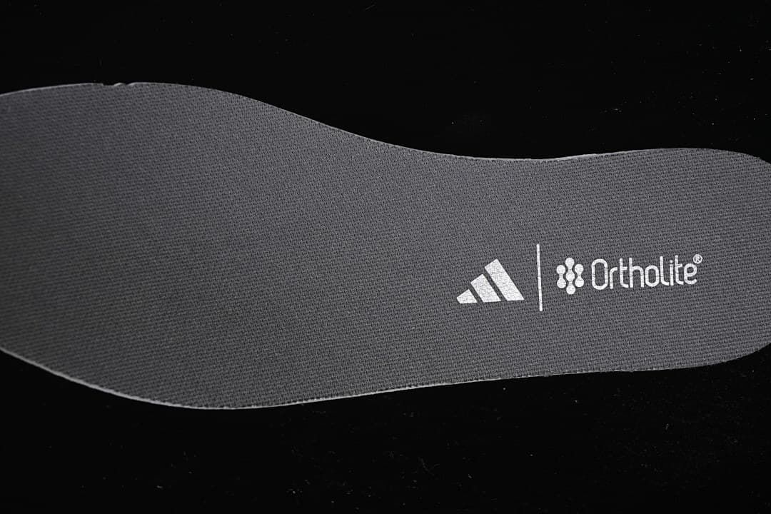 Close-up of the insole marked adidas and Ortholite.