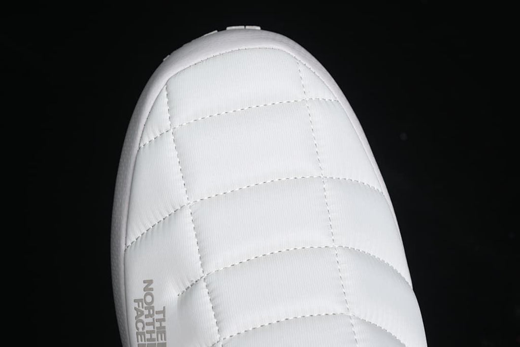 Top-down close-up of the stitched quilted toe.