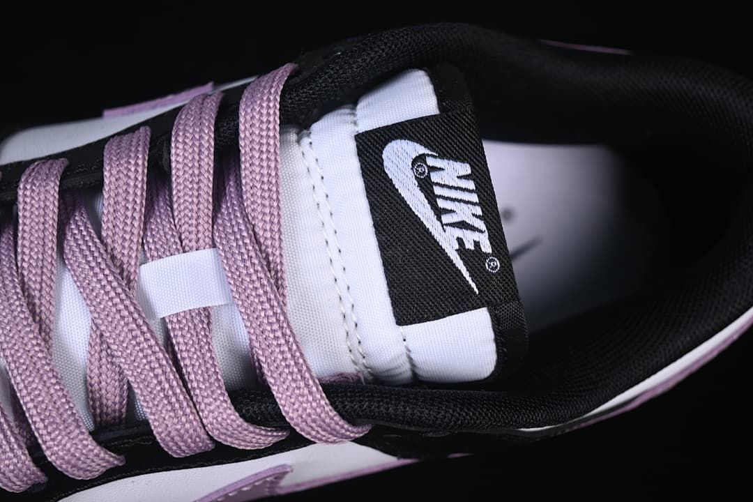 Close-up of the tongue label and purple laces
