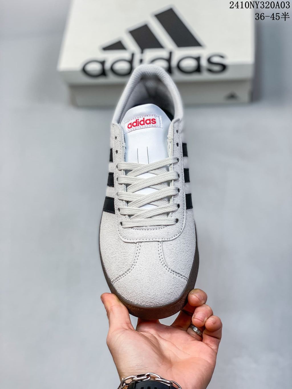 Top view of the sneaker showing the laces, toe and tongue branding