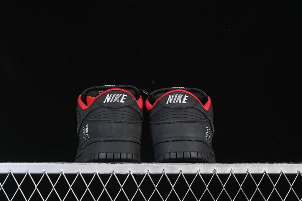 Rear view of both shoes showing heel stitching and white 94 details