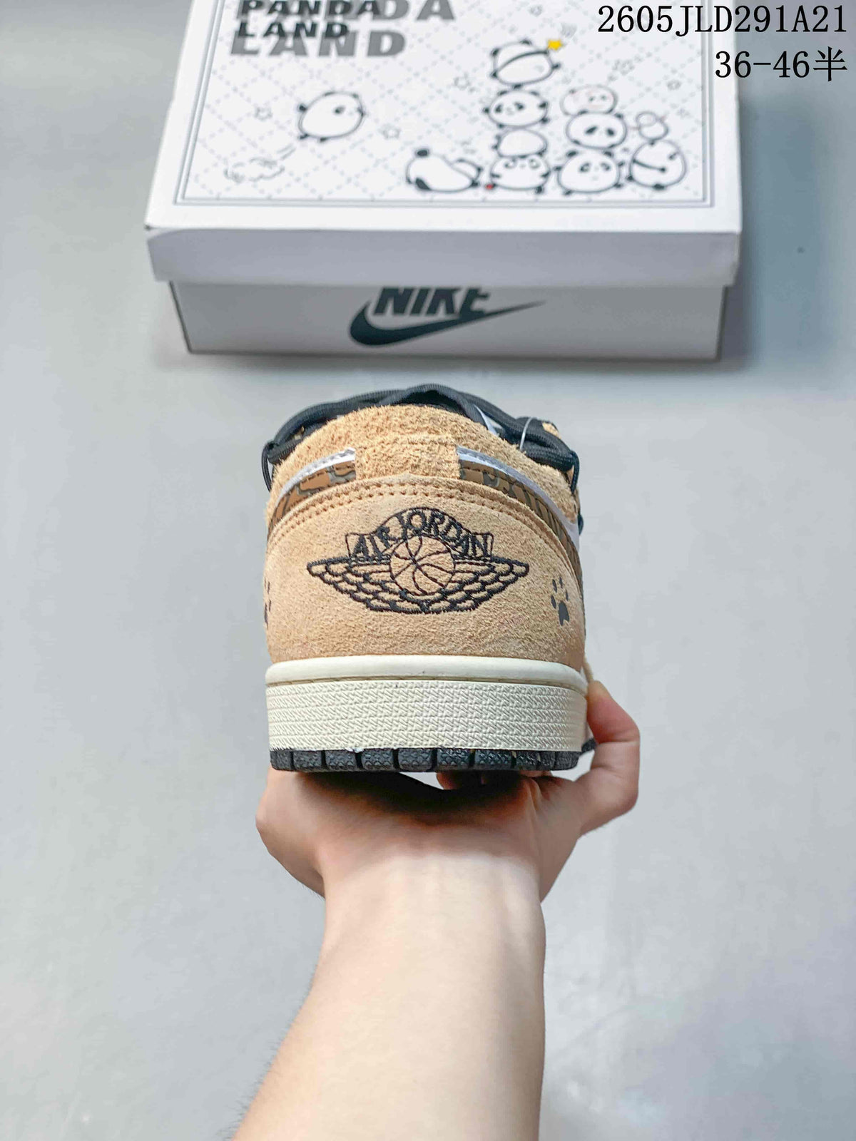 Rear view showing tan heel panel and embroidered winged basketball emblem