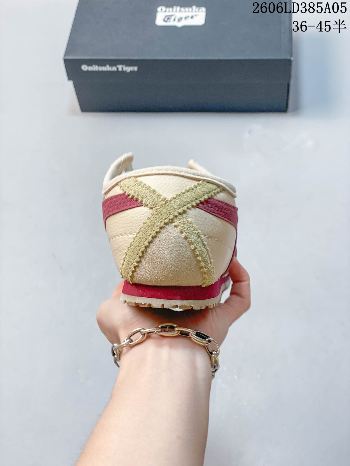 Rear view showing the heel overlays and burgundy heel accent