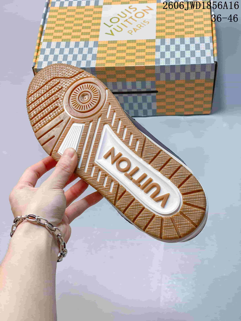 Close-up of the sneaker outsole with gum-colored tread