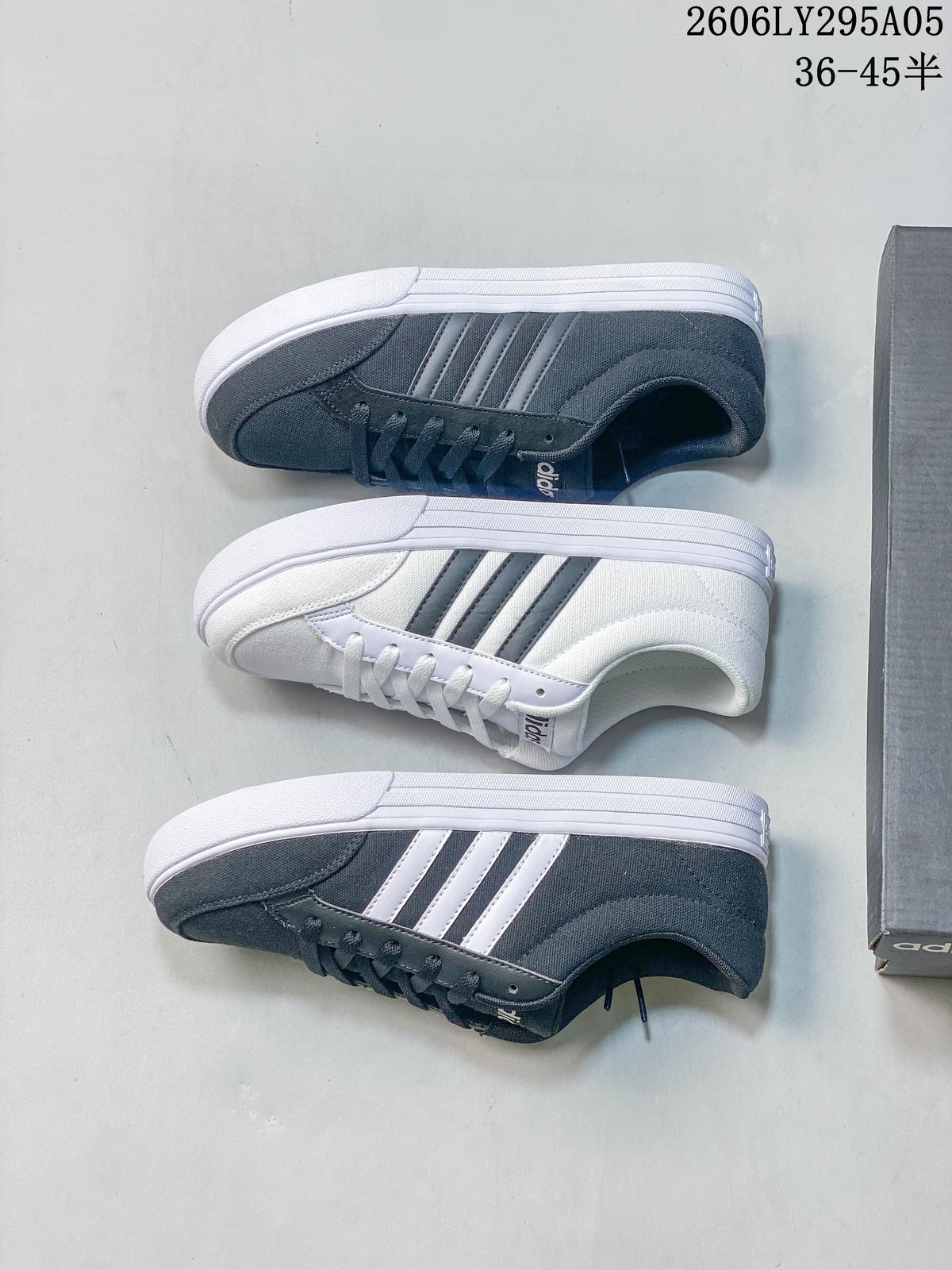 Three adidas low-top sneakers shown from above, including white and charcoal gray colorways.