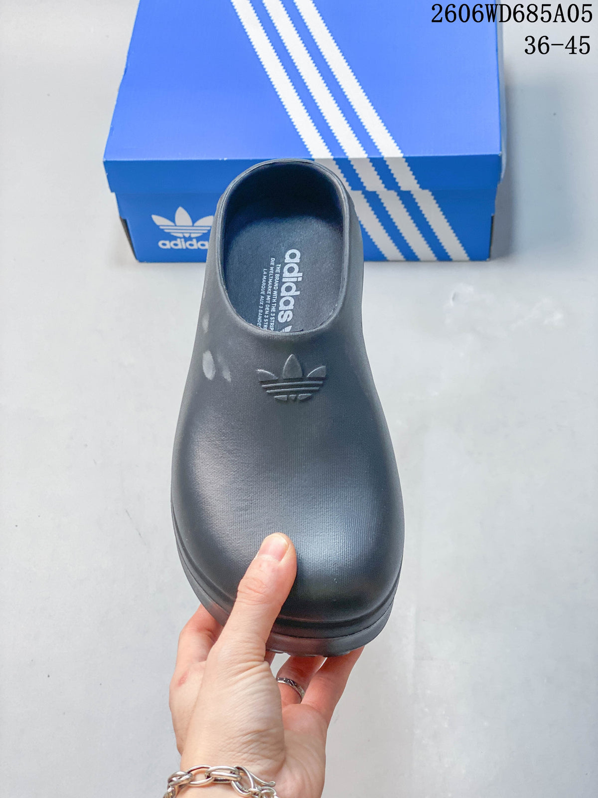 Top view of the closed-toe mule with Adidas branding
