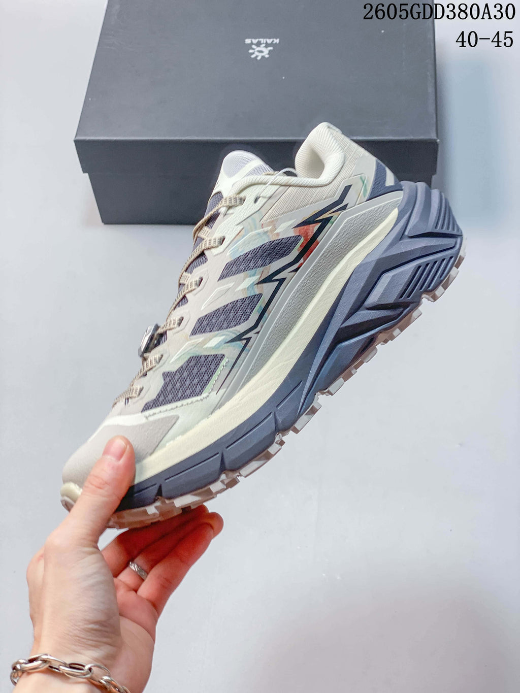 Side view of a Kailas C4 low-cut trail running shoe