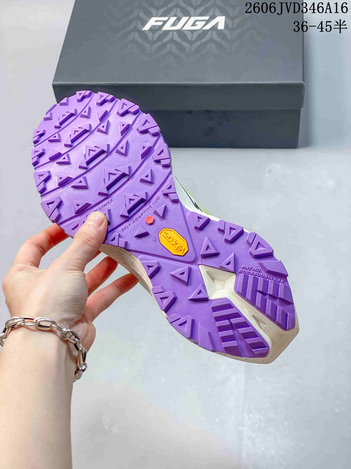 Close-up of the purple lugged outsole on a Kailas FUGA EX3 trail shoe