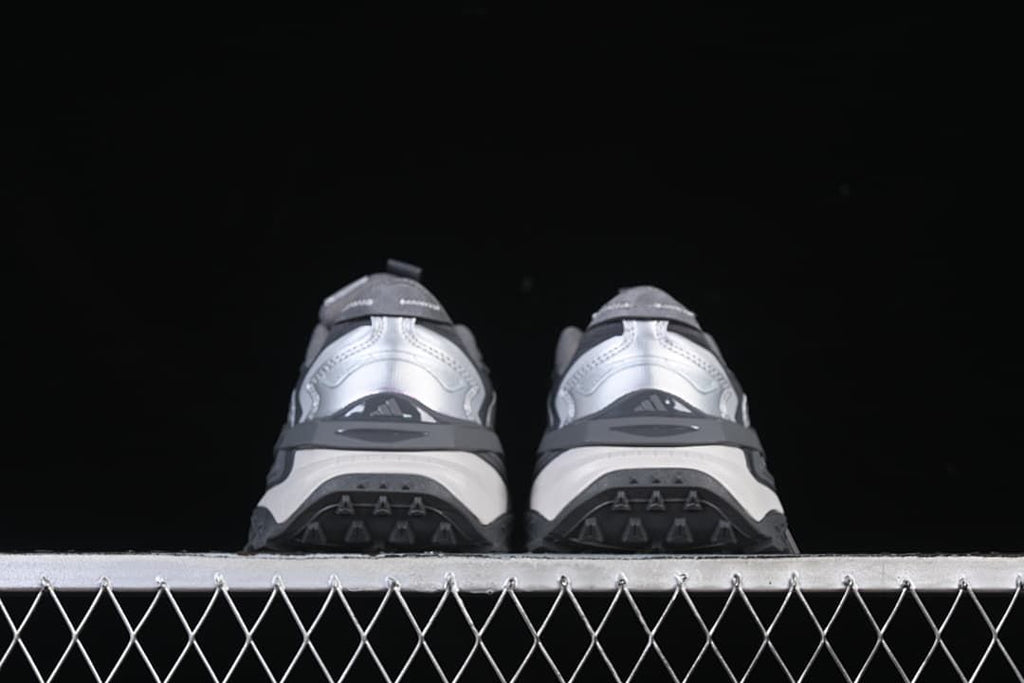 Rear view of both sneakers showing heel and outsole details.