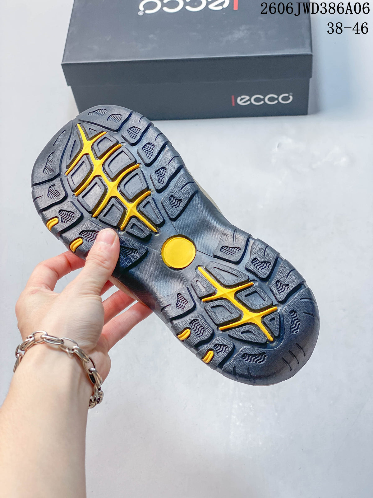Close-up of the sandal outsole with a patterned tread and yellow accents.