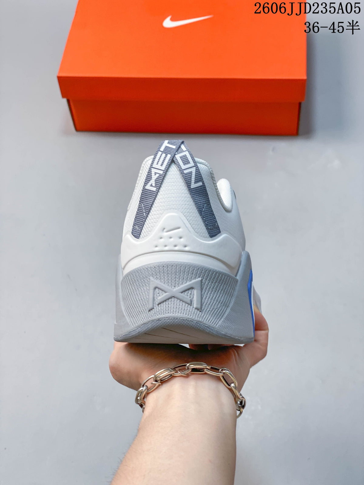 Rear view showing the heel pull tabs and gray-blue heel details