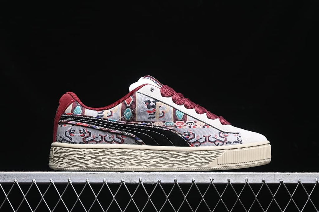 Side profile highlighting the patterned panels and cream-colored sole