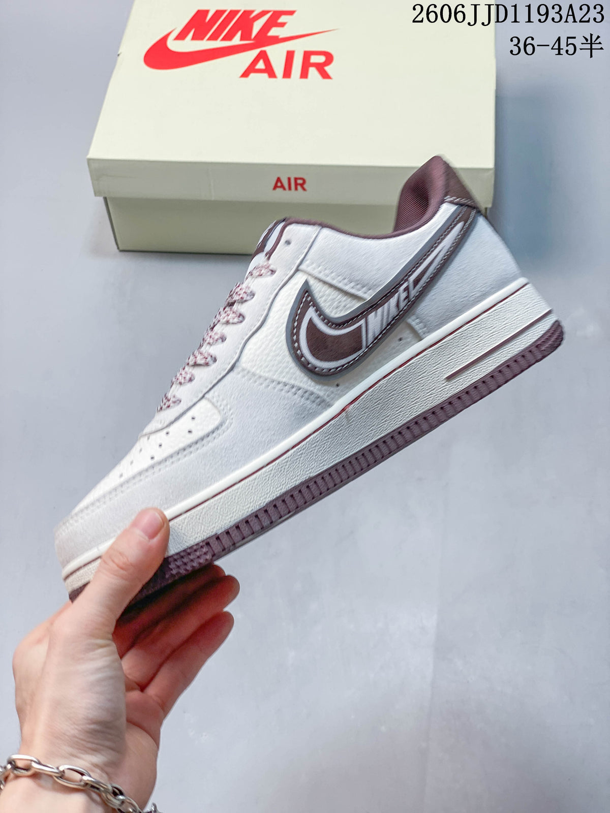 Side view highlighting the large contrasting Swoosh and low-top profile