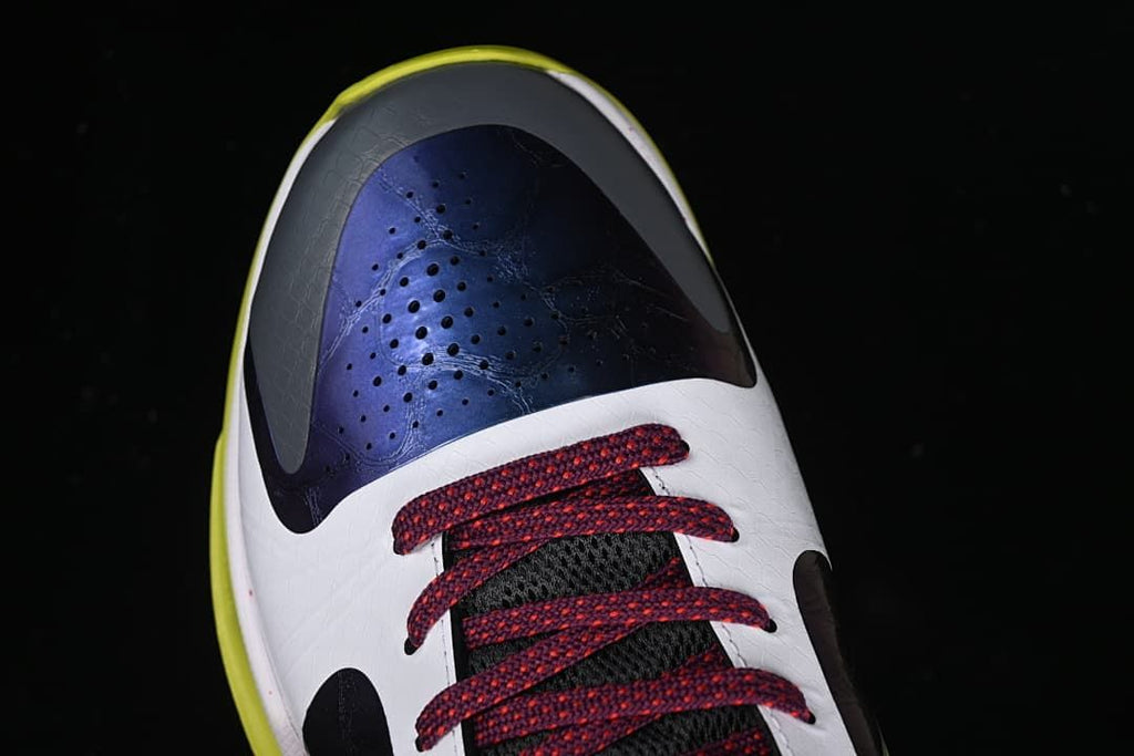 Top-down view of the perforated toe area and burgundy laces.