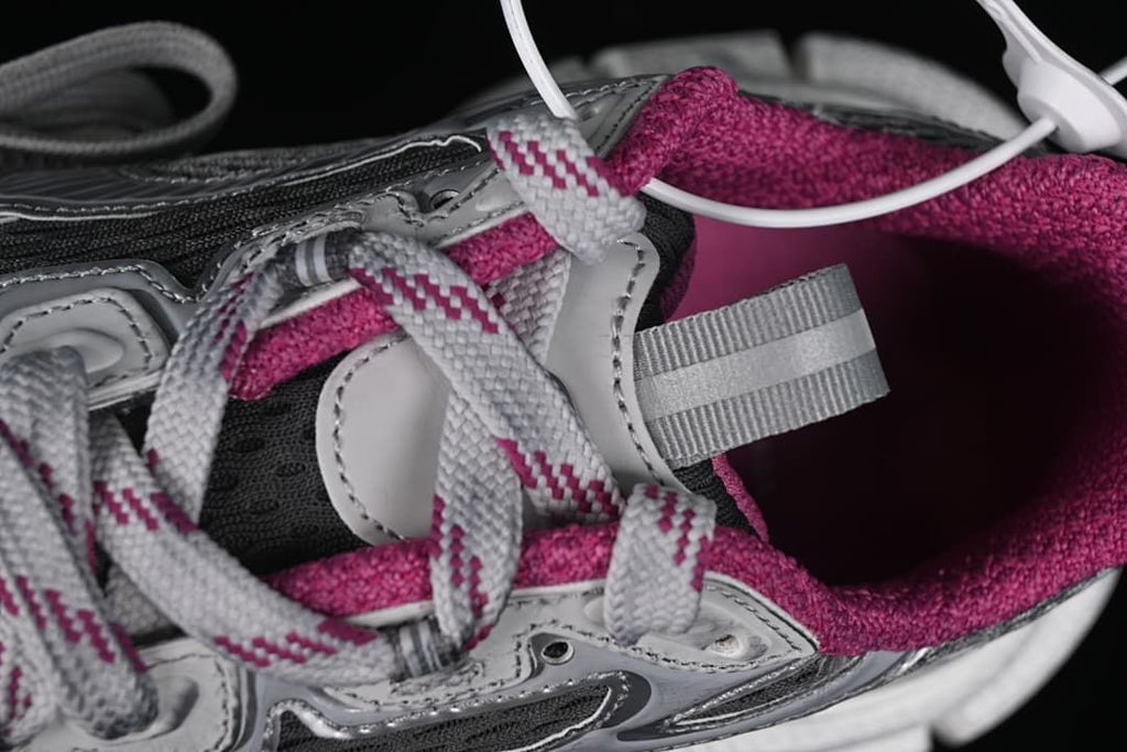 Close-up of the lace area, pull tab and pink lining