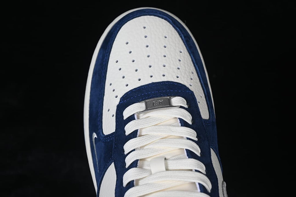 Top view of the perforated toe box and white laces.
