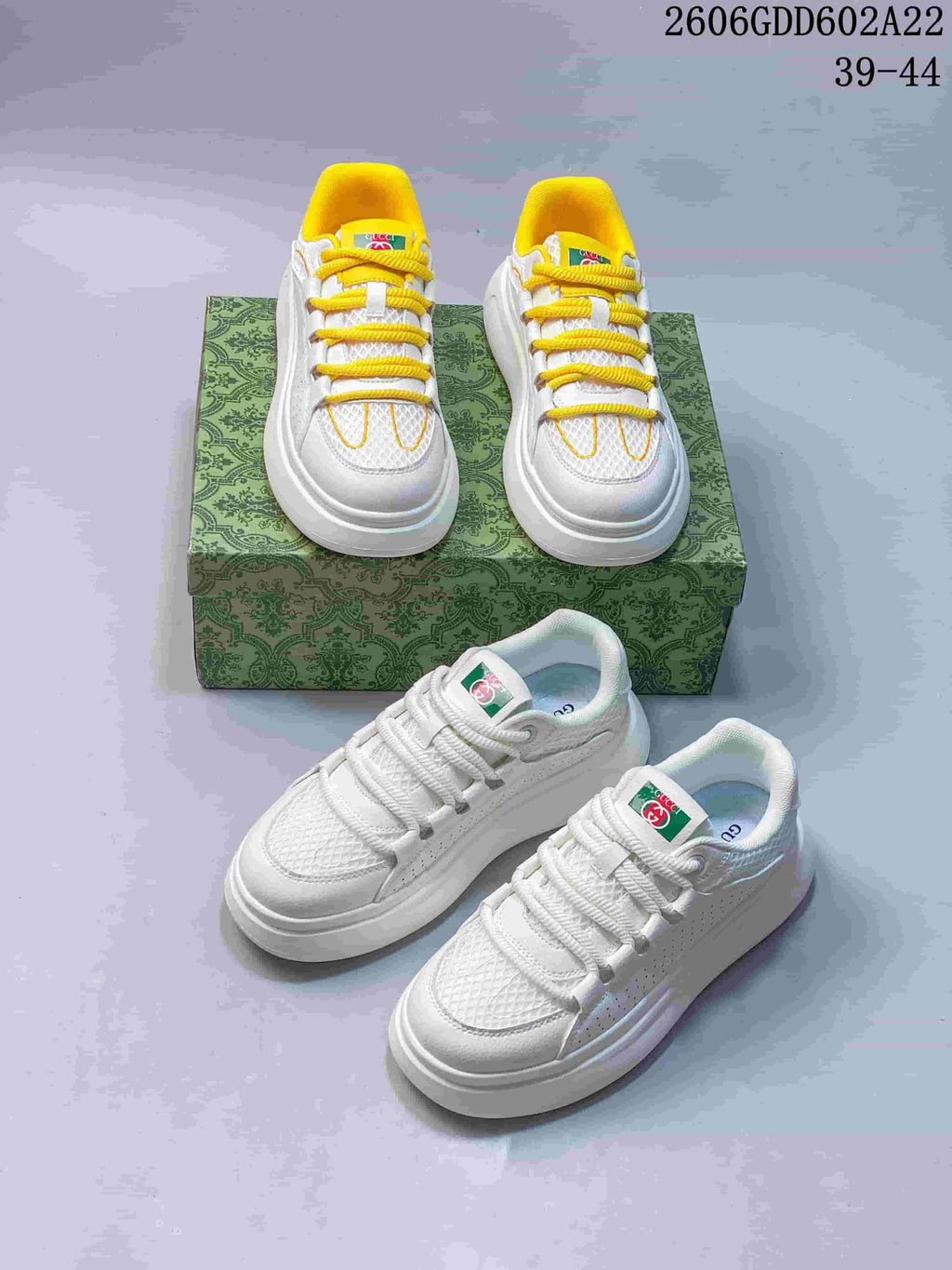 Two white sneaker color variations, one with yellow accents and one all-white.