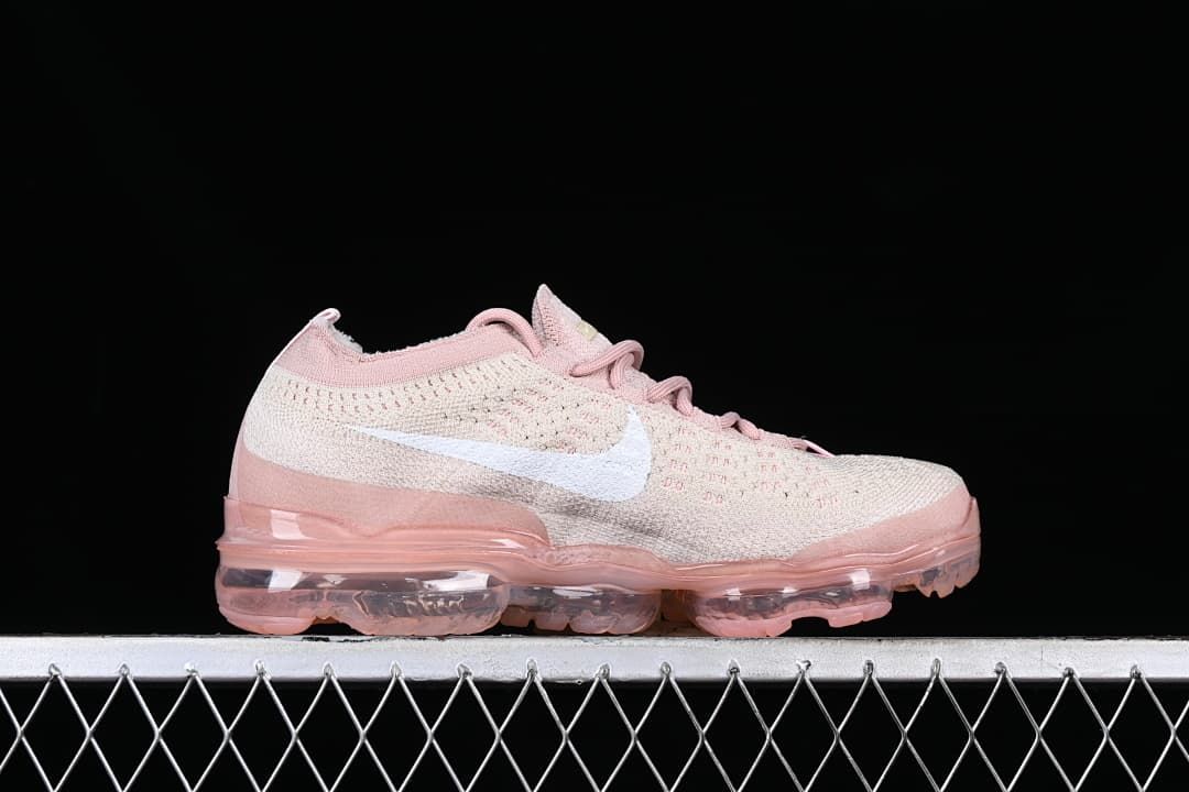 Side profile of the shoe with white Swoosh and visible sole units.