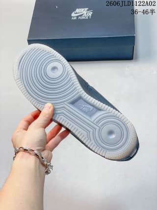 Underside view showing the concentric-circle and textured outsole pattern.