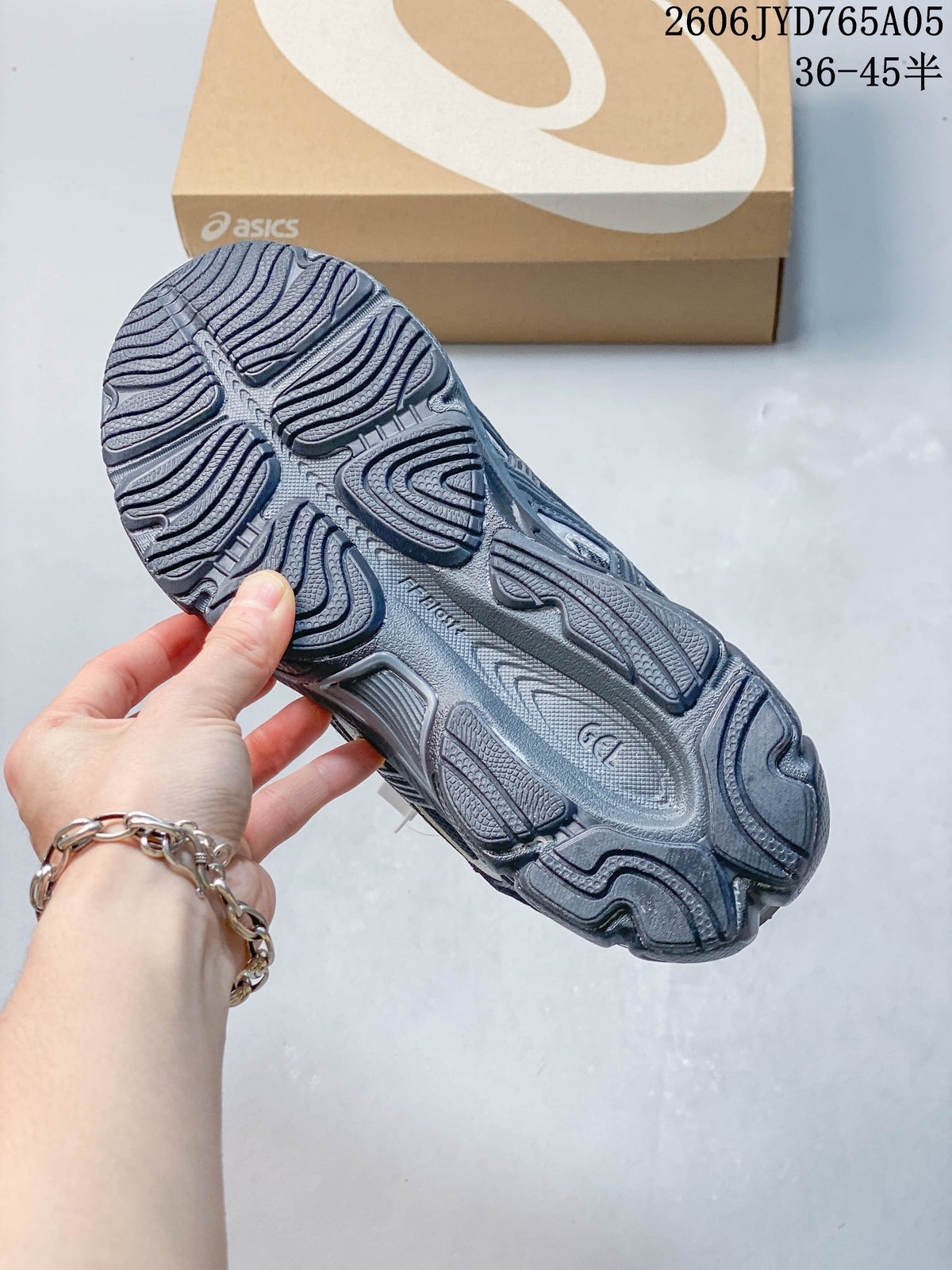 Close-up of the sneaker outsole with patterned tread
