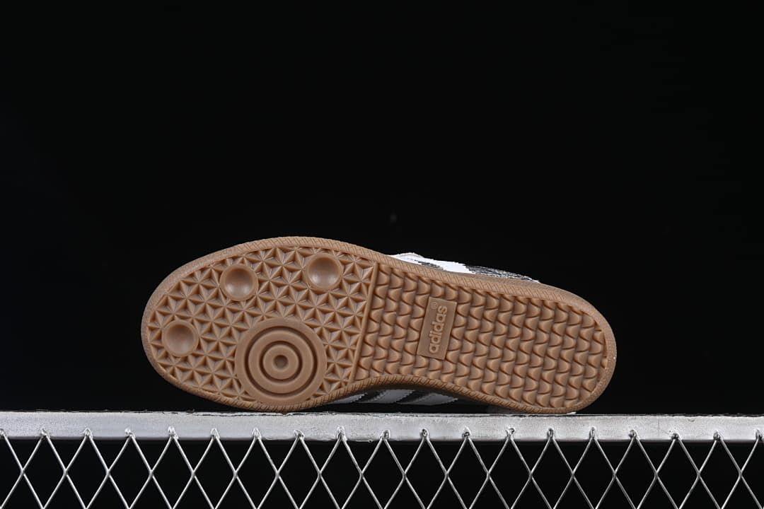 Underside view of the gum-colored outsole with patterned tread