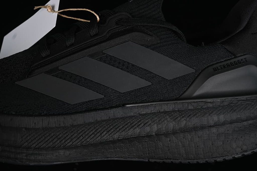 Close-up of the tonal side stripes and sculpted sole