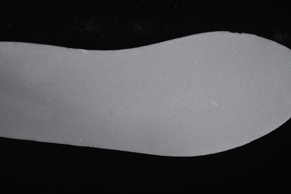 Close-up of a plain gray shoe insert