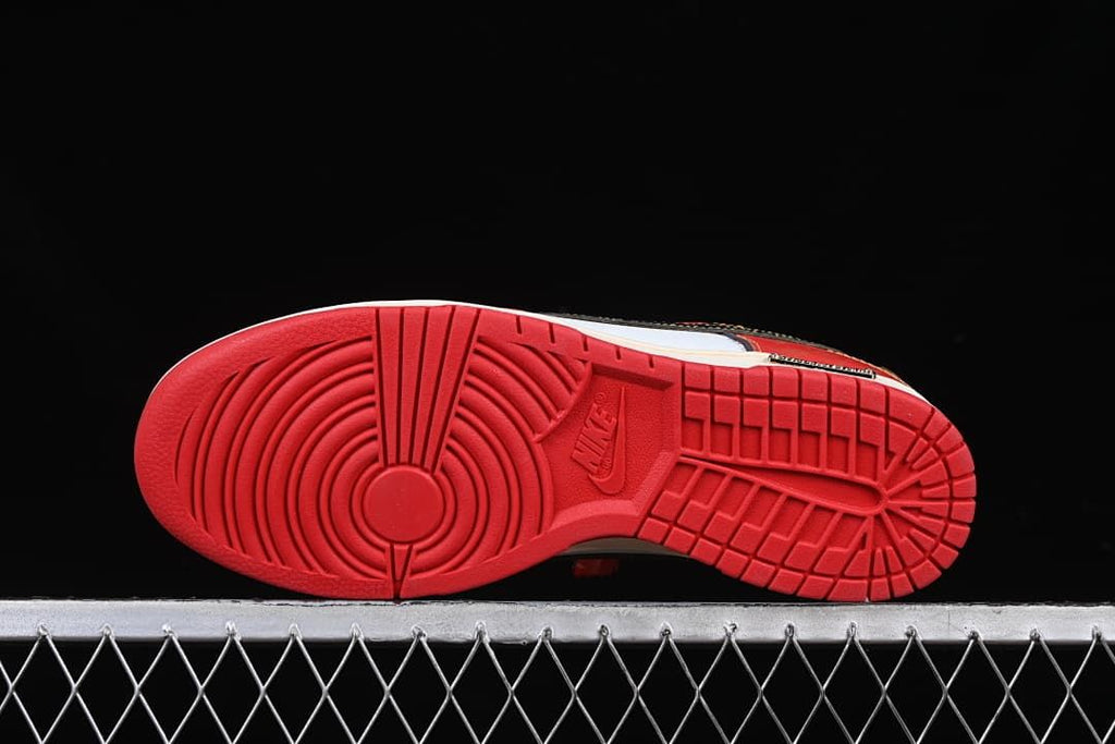 Underside view showing the red outsole tread
