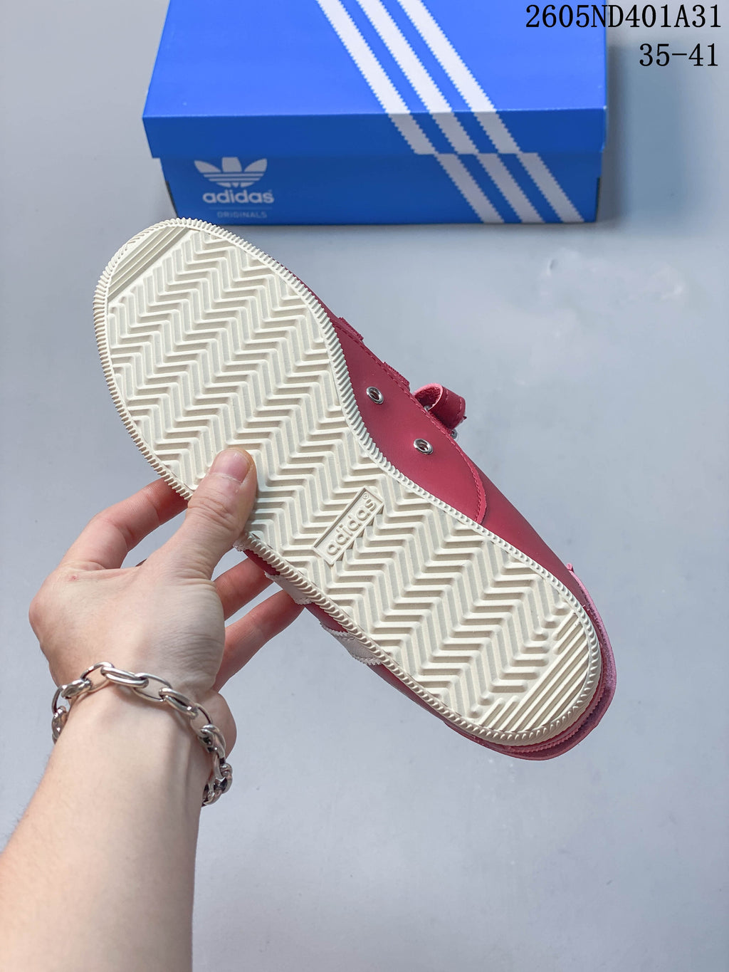 Close-up of the cream-colored outsole with herringbone tread