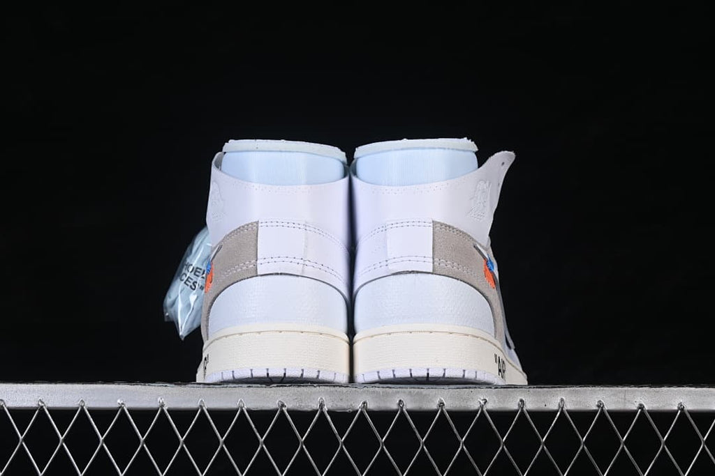 Rear view showing heel panels and contrasting midsoles